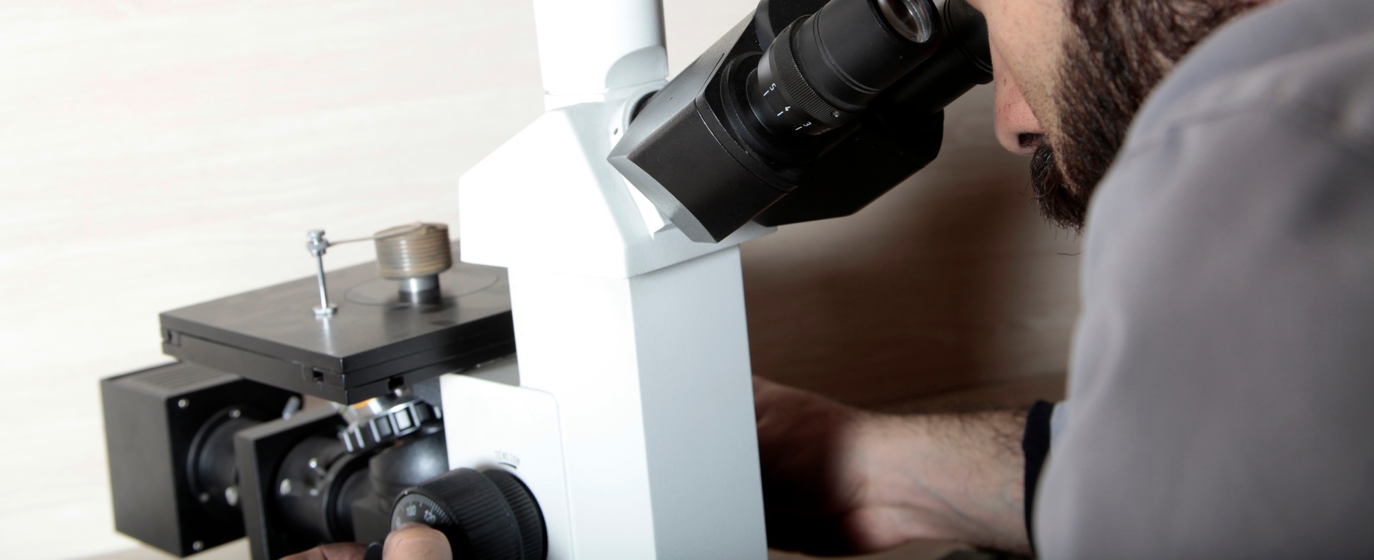 Examination with a microscope. Metal hardness measurement.